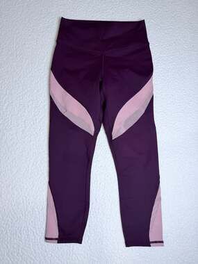 Fabletics Powerhold High-Waisted Mesh Panel Tights in Purple and Pink